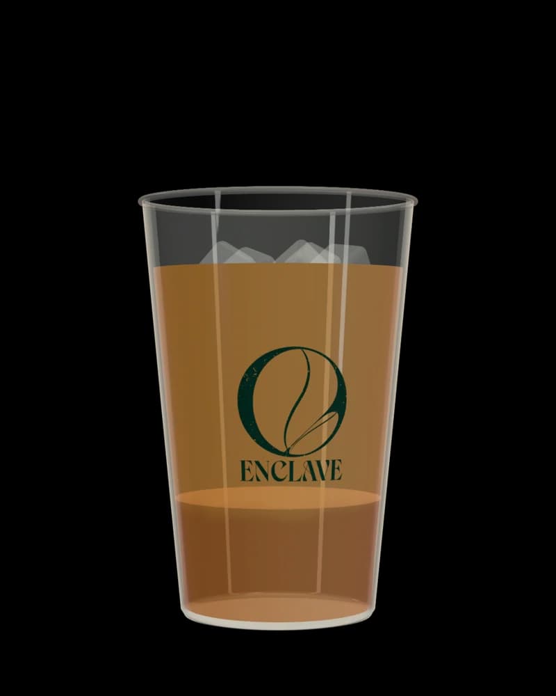 Honey Peach Tea in a clear Enclave cup.